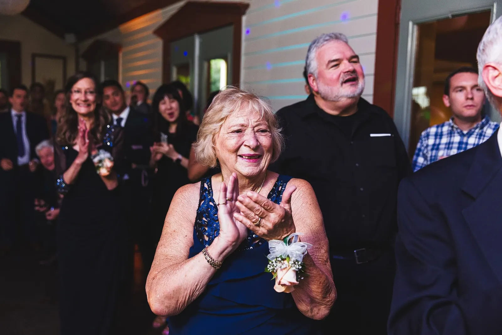 Guest clapping during the grand entrance