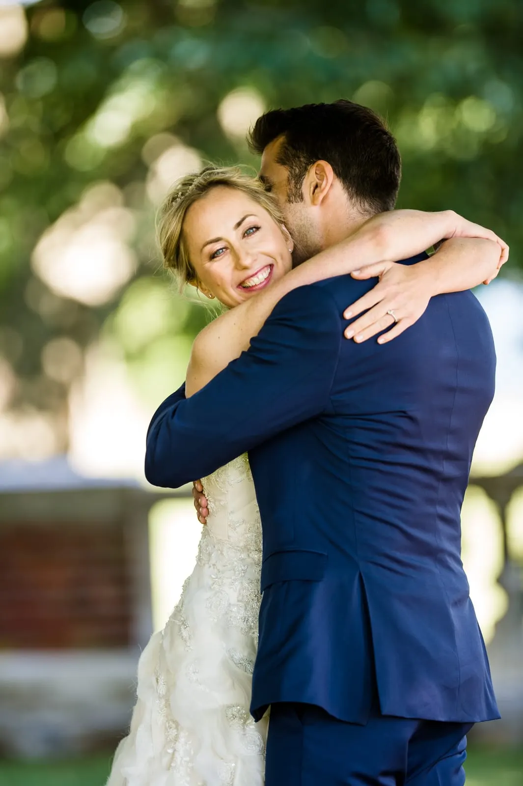Bride hugging the groom during their first look