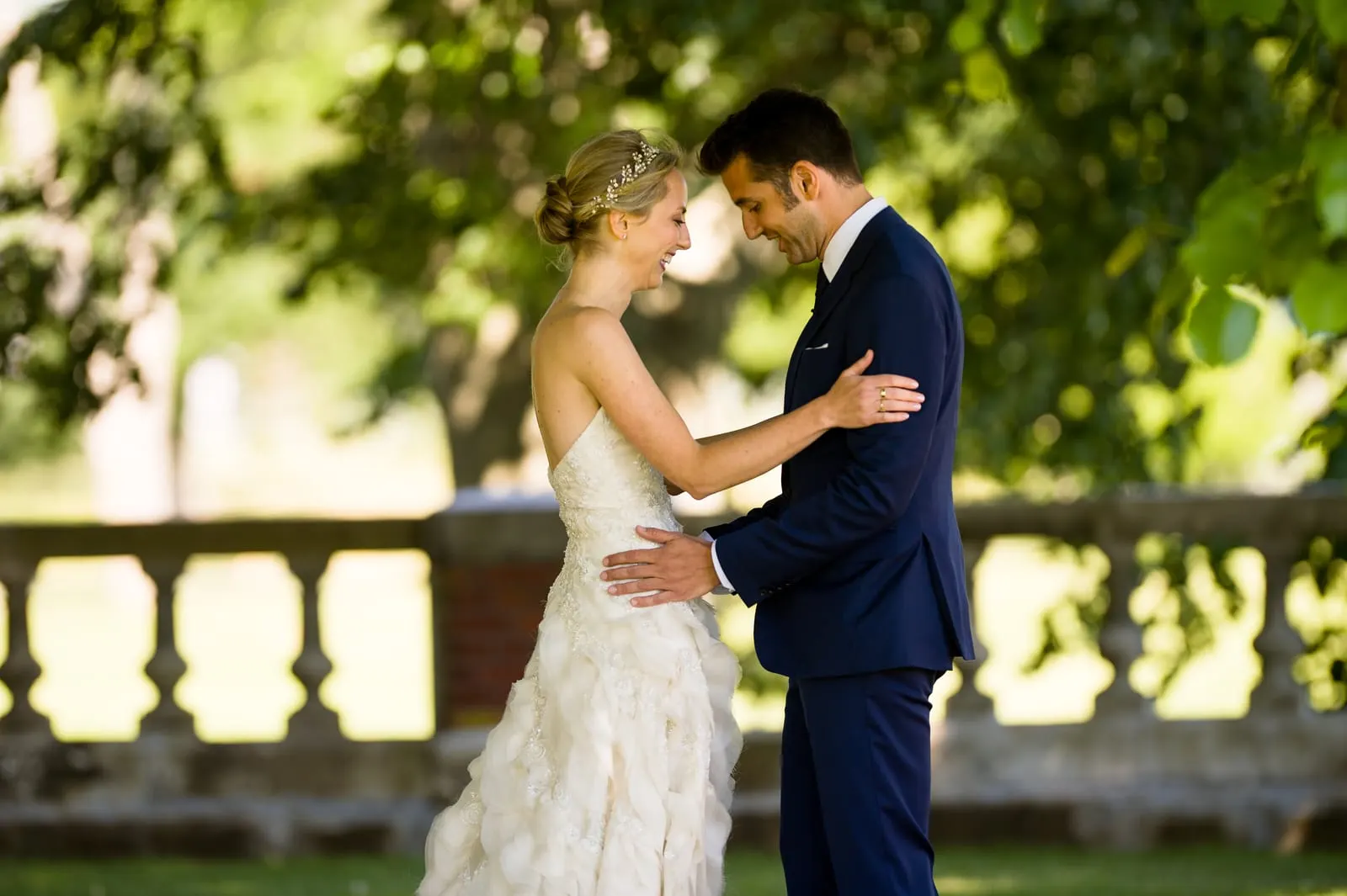 Bride and groom touching foreheads during their first look