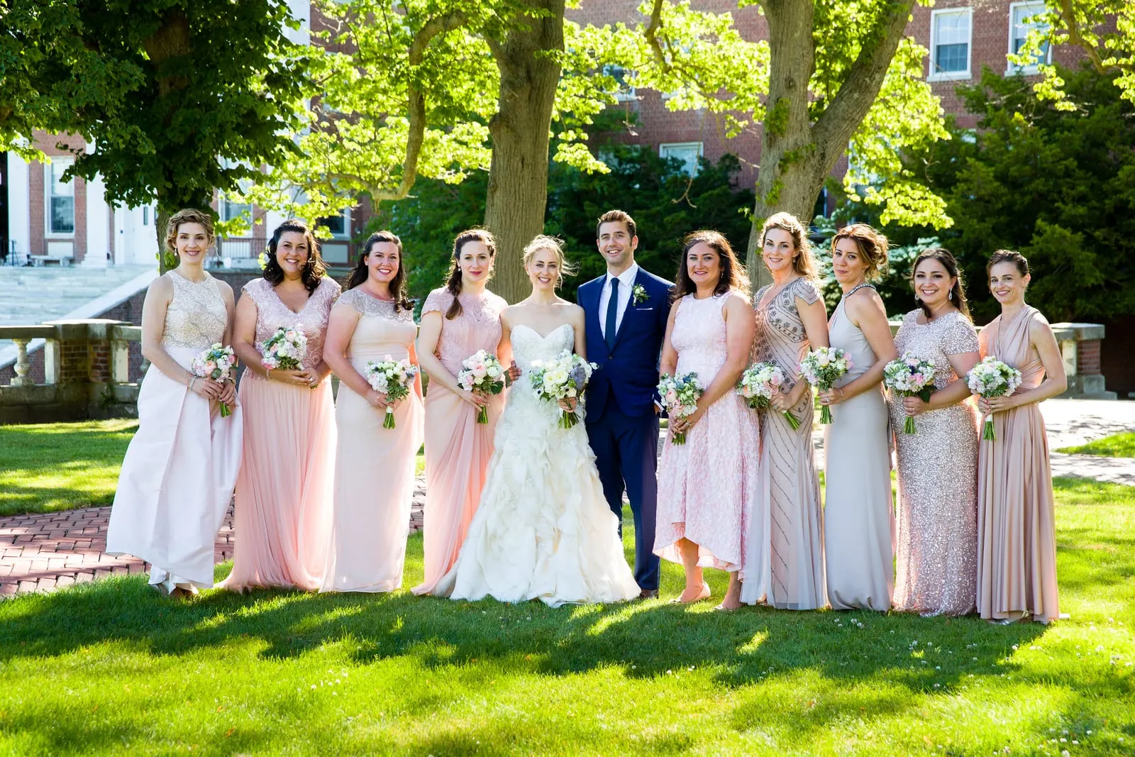 Bride with her bridesmaids in blush gowns