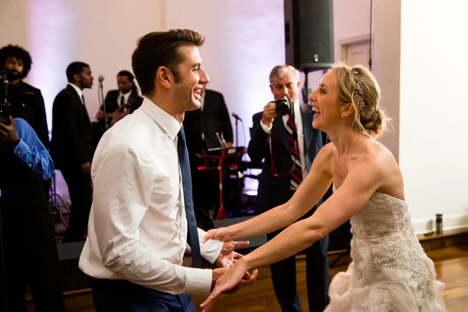 Bride and groom dancing together