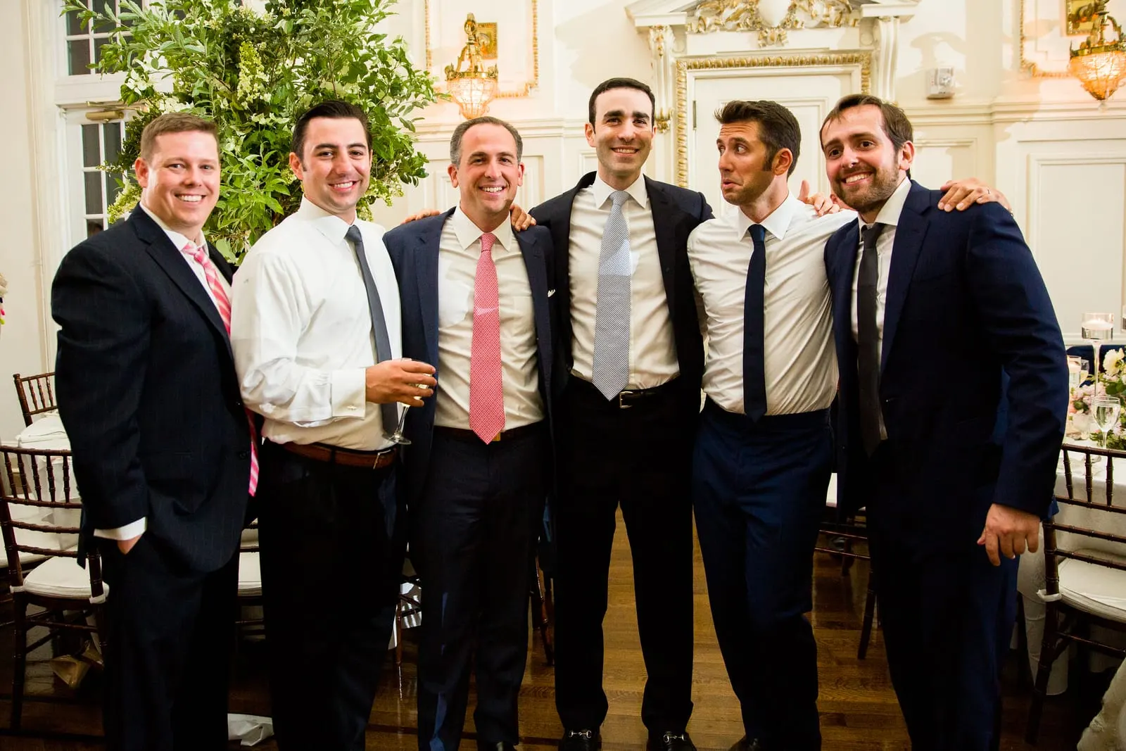 Groom with friends on the dance floor