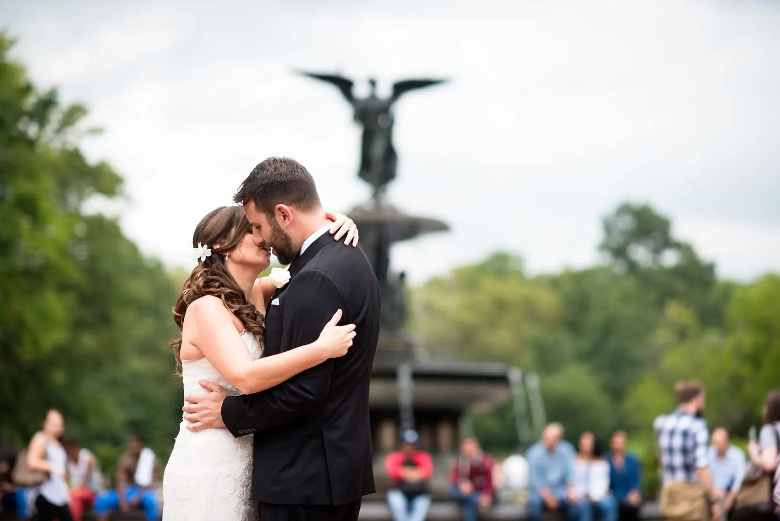 Bride and groom forehead to forehead at Bethesda Fountain