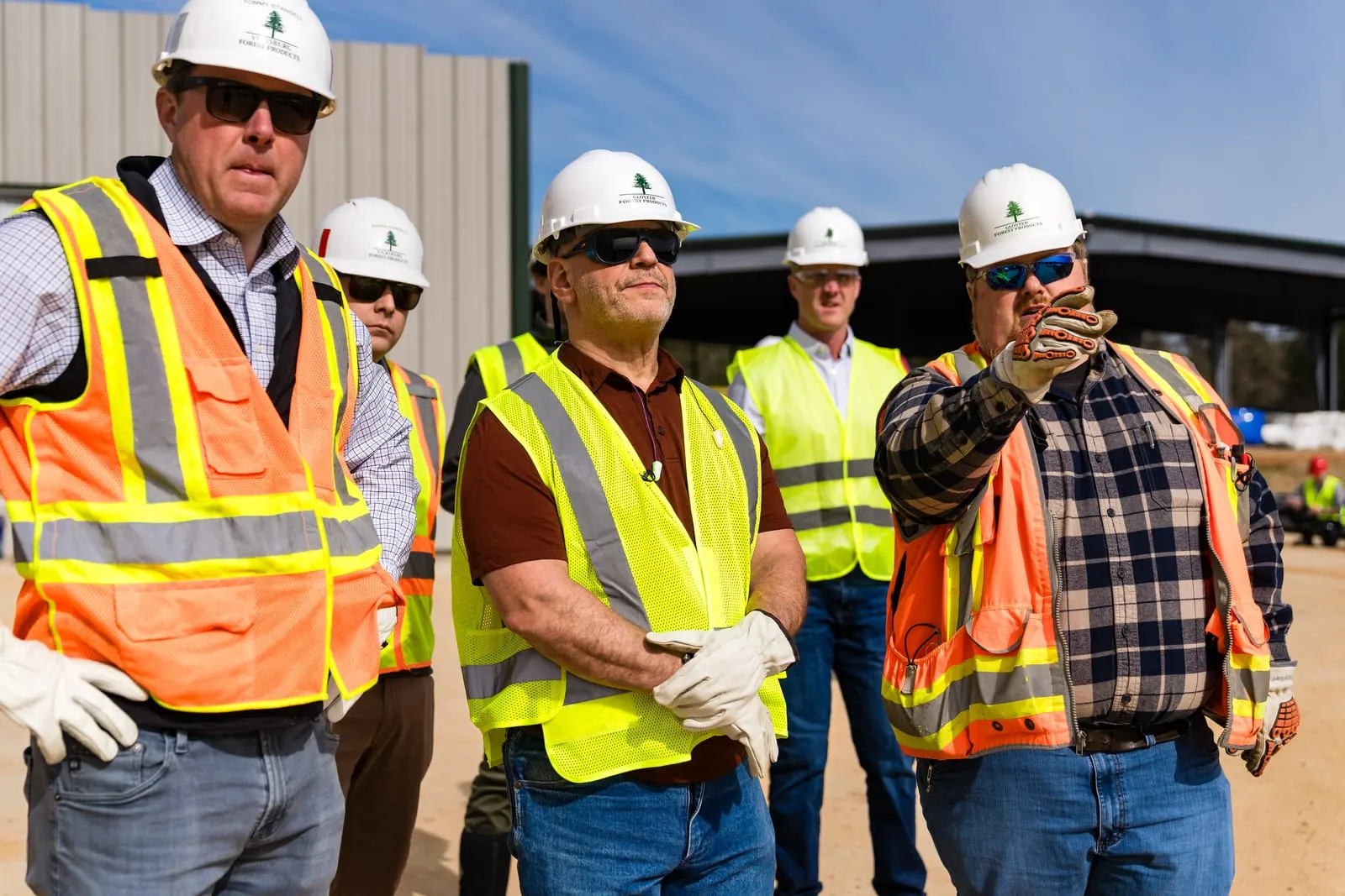 Leaders talking at the new construction site
