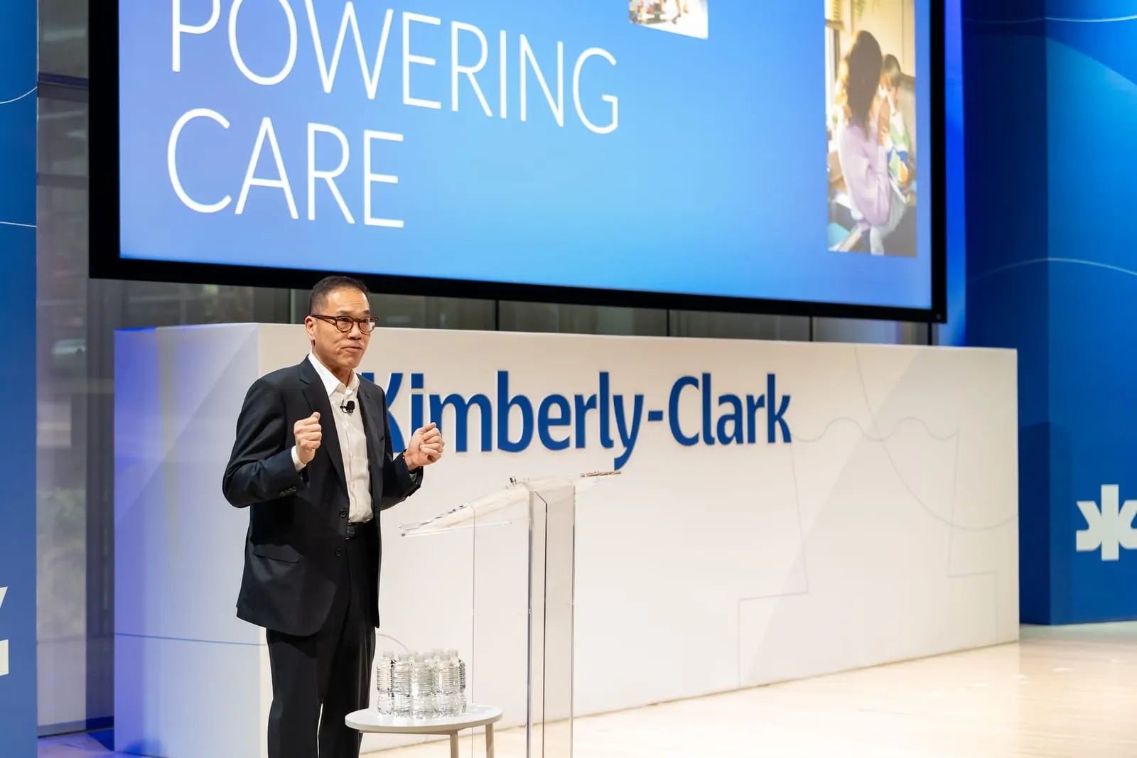 Keynote speaker beneath the Powering Care slide