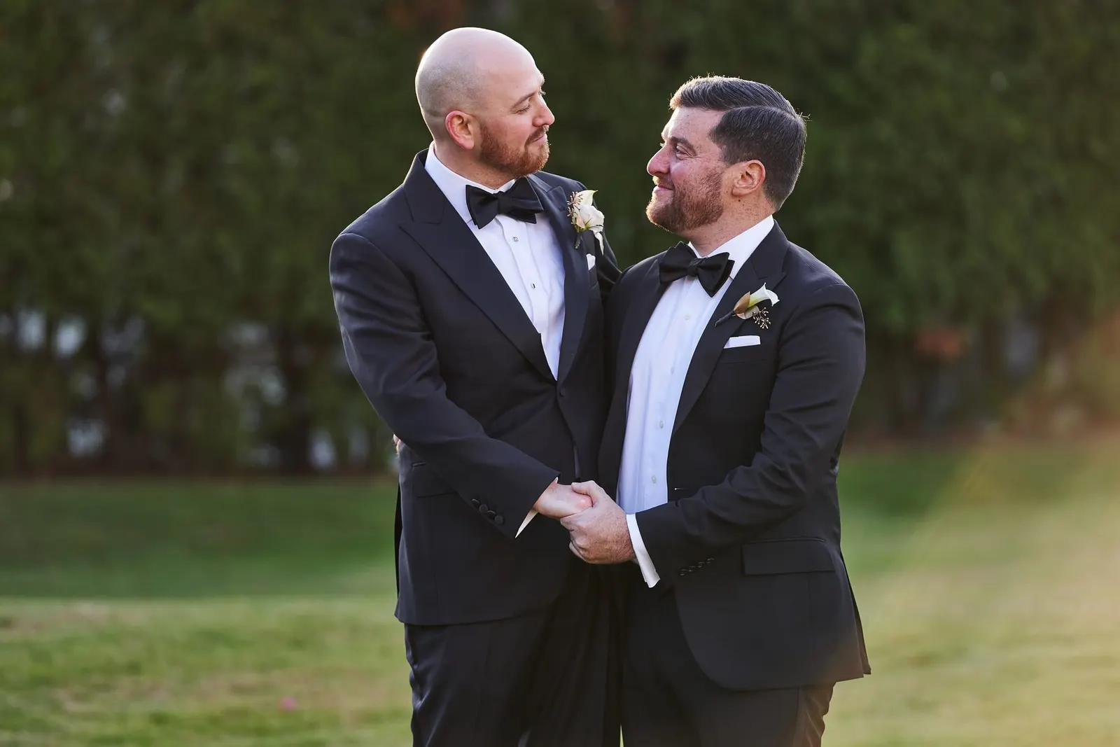 Groom laughing with a groomsman