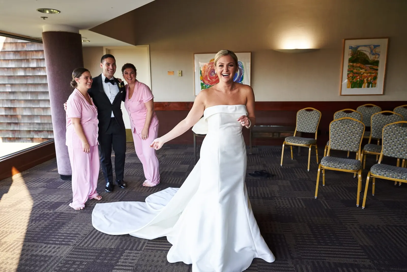 Bride sharing a moment with her family while getting ready
