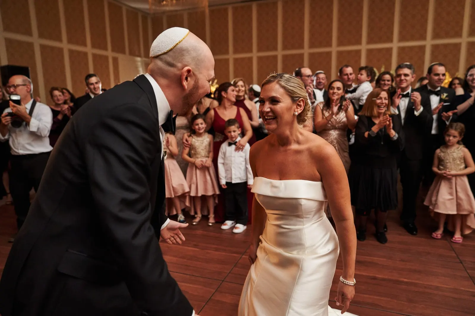 Groom spinning the bride during their first dance