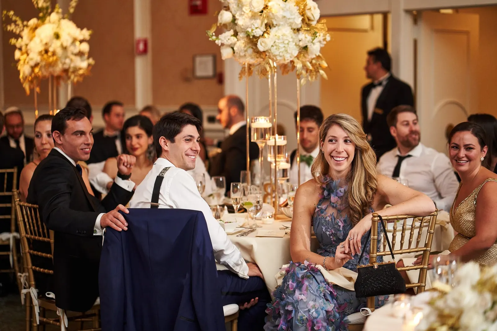 Guests enjoying dinner in the ballroom
